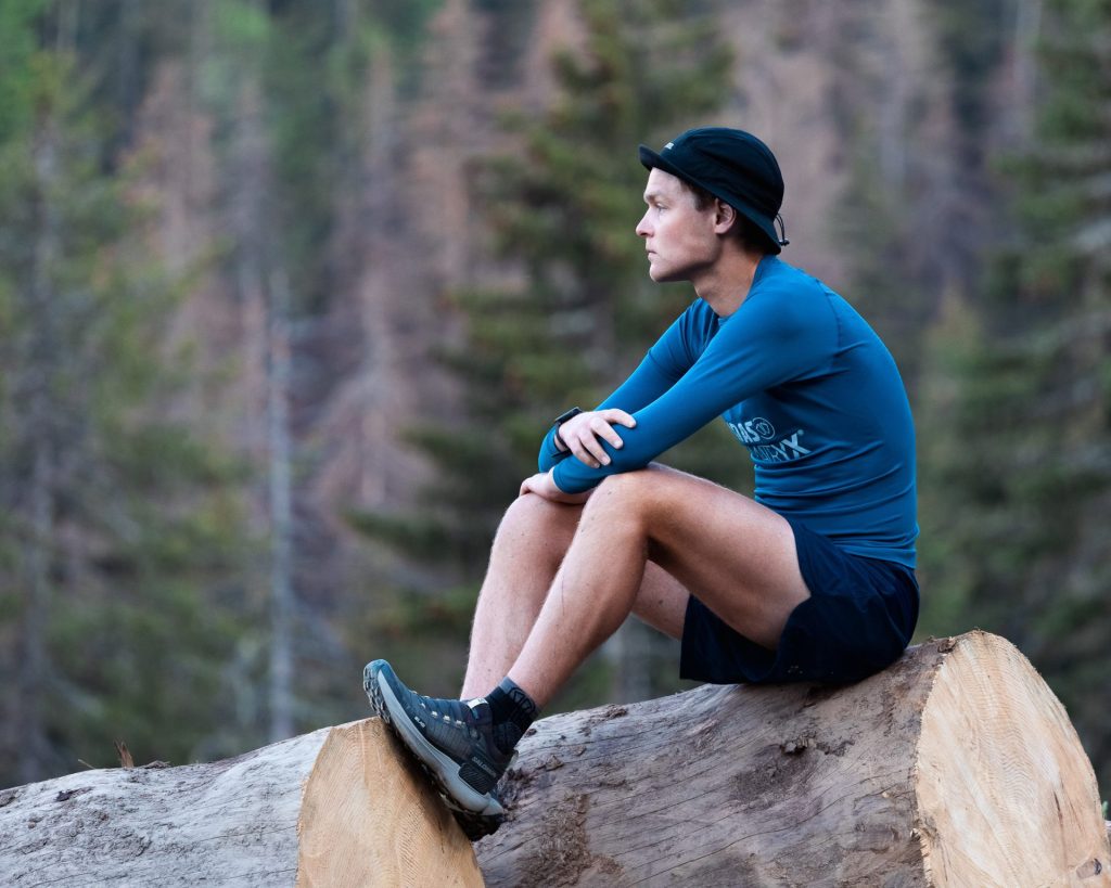 baptiste chassagne sitting on a wooden trunk