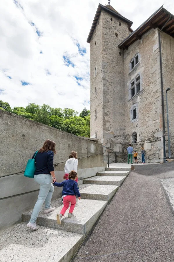 parent child climbing stairs chateau rubins sallanches